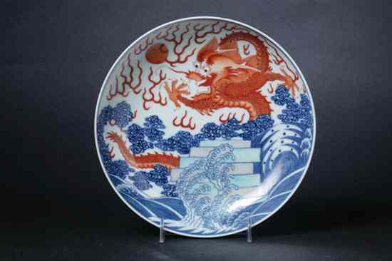 Appraisal: CHINESE IRON RED DOUCAI BLUE AND WHITE PORCELAIN SAUCER Kangxi