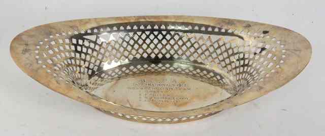 Appraisal: An oval silver trophy basket London of pierced form inscribed