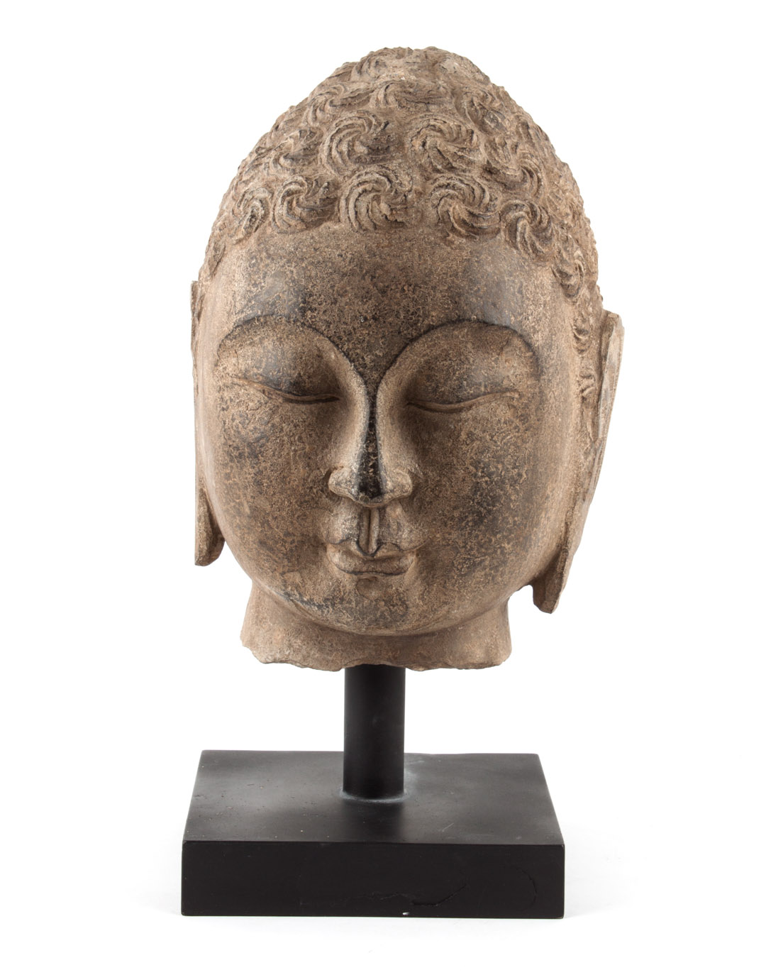 Appraisal: Chinese carved stone head of the Buddha in the Wei