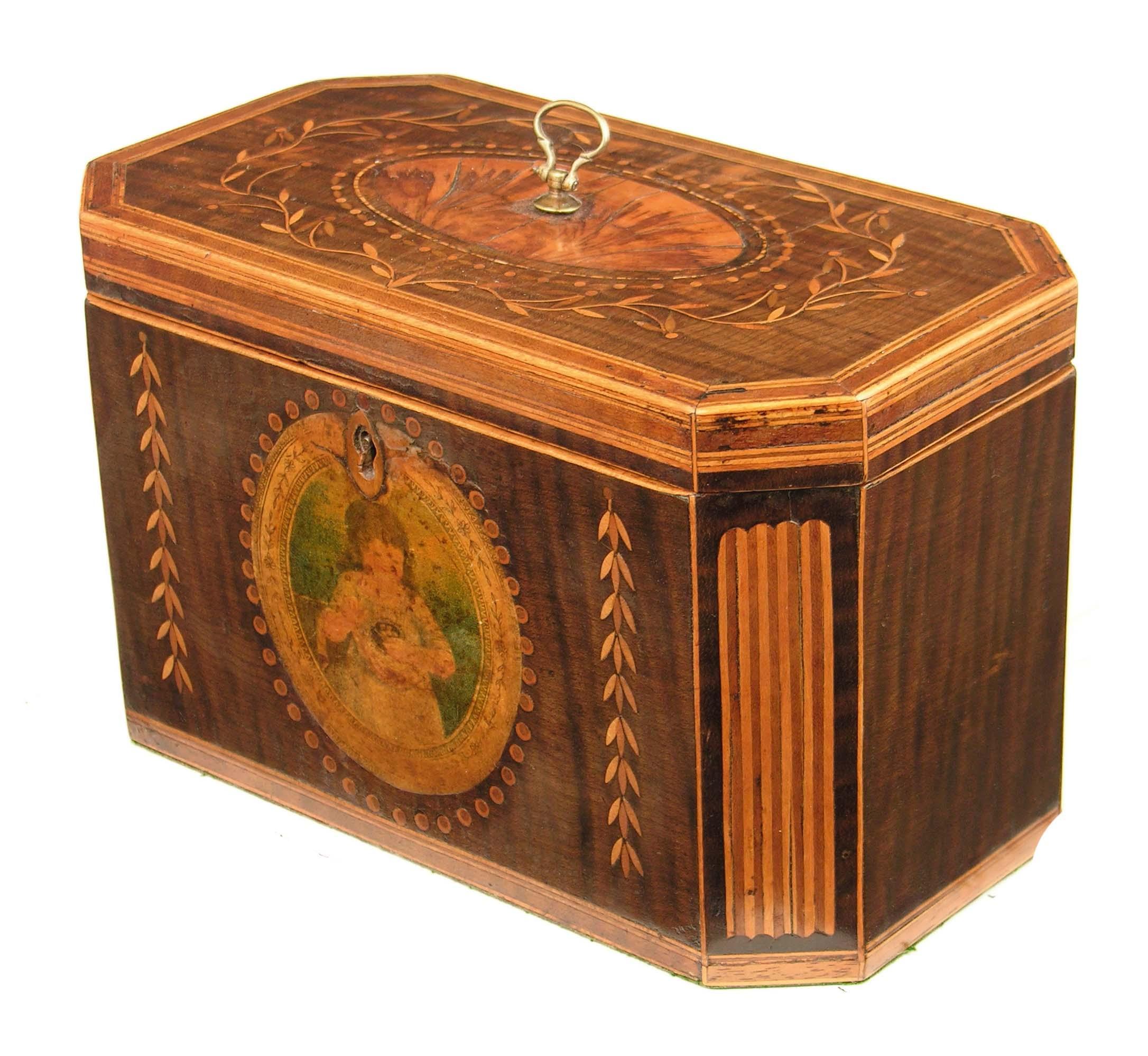 Appraisal: A late George III harewood and marquetry tea caddy