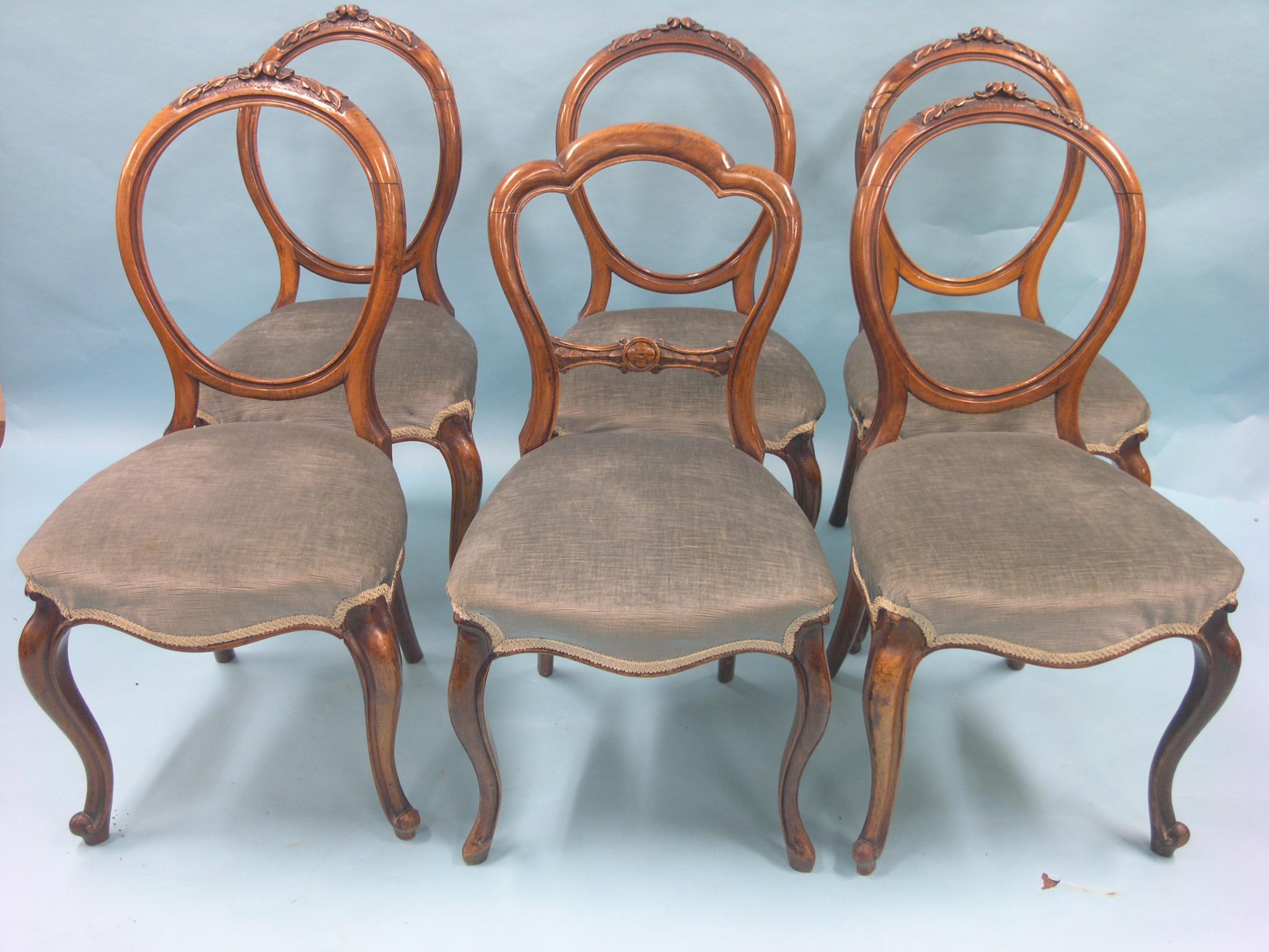 Appraisal: A set of five Victorian walnut balloon-back dining chairs top