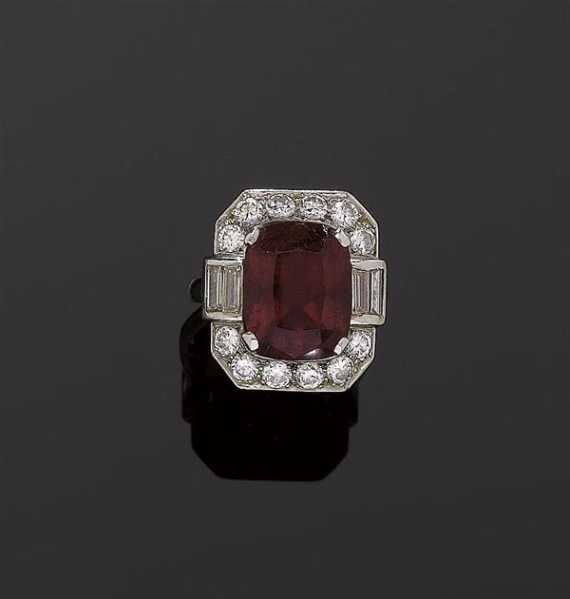 Appraisal: TOURMALINE AND DIAMOND RING ca Platinum Classic model the octagonal