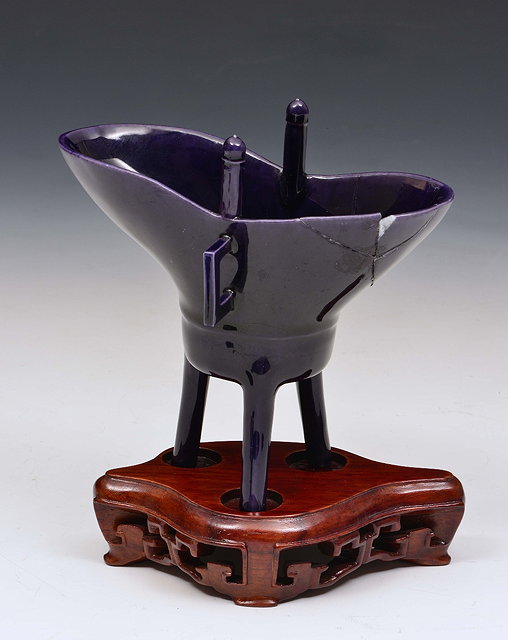 Appraisal: A CHINESE JUE VESSEL decorated with a dark purple glaze