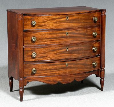 Appraisal: American Sheraton mahogany chest bow front with reeded outset columns