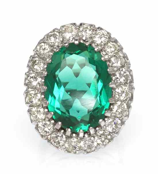 Appraisal: A Karat White Gold Simulated Emerald and Diamond Ring containing