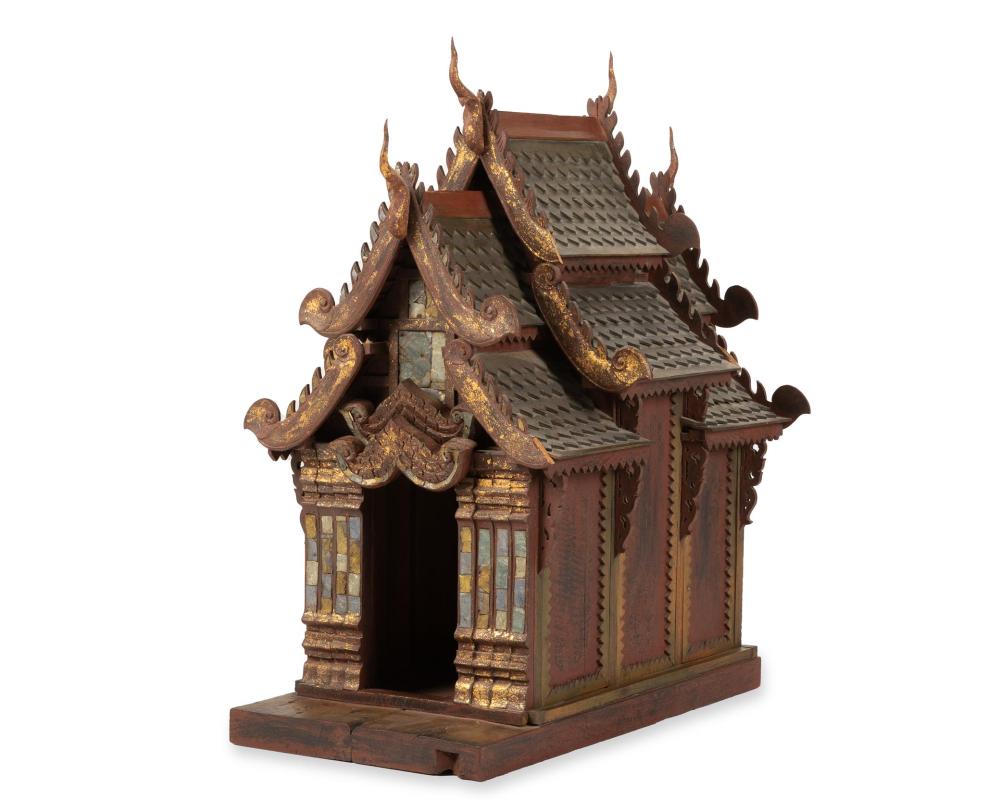 Appraisal: A large Thai carved wood spirit house The carved and