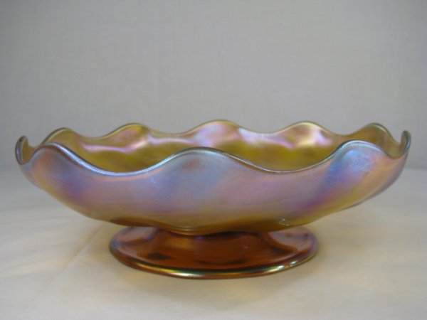 Appraisal: Tiffany aurene iridescent scalloped edge compote bowl Etched on base