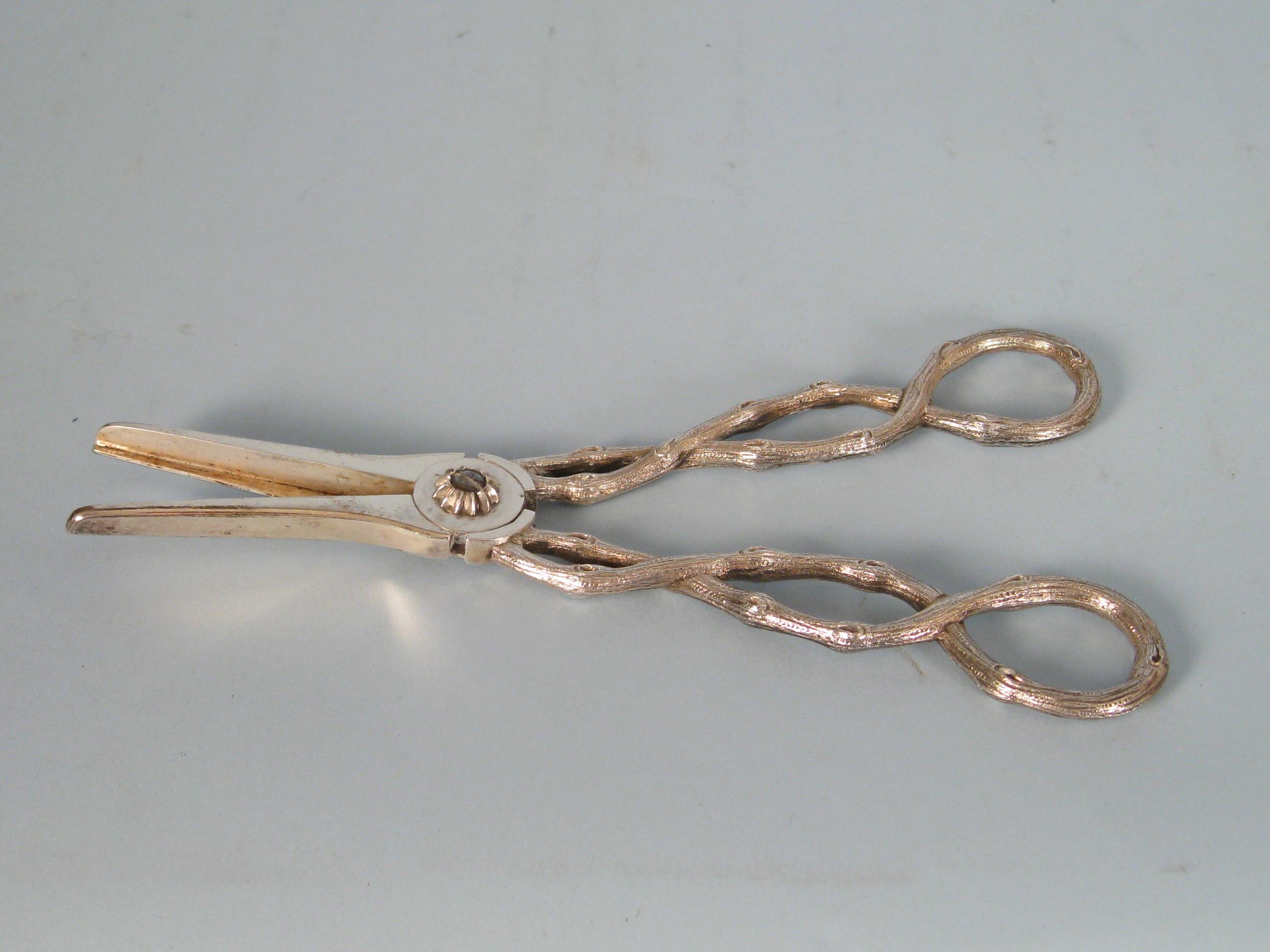 Appraisal: Pair of Victorian Grape Scissors with cast twisted branch handles