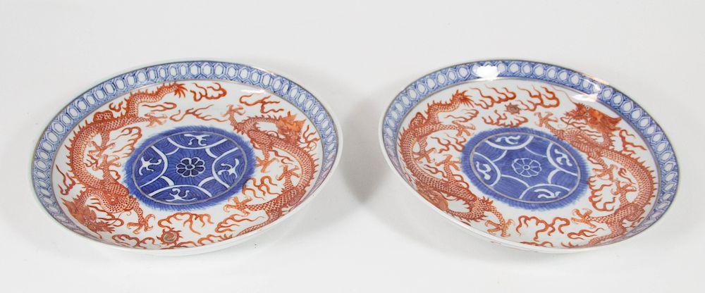 Appraisal: A Pair of Guangxu Dragon Plates Two dragons painted in