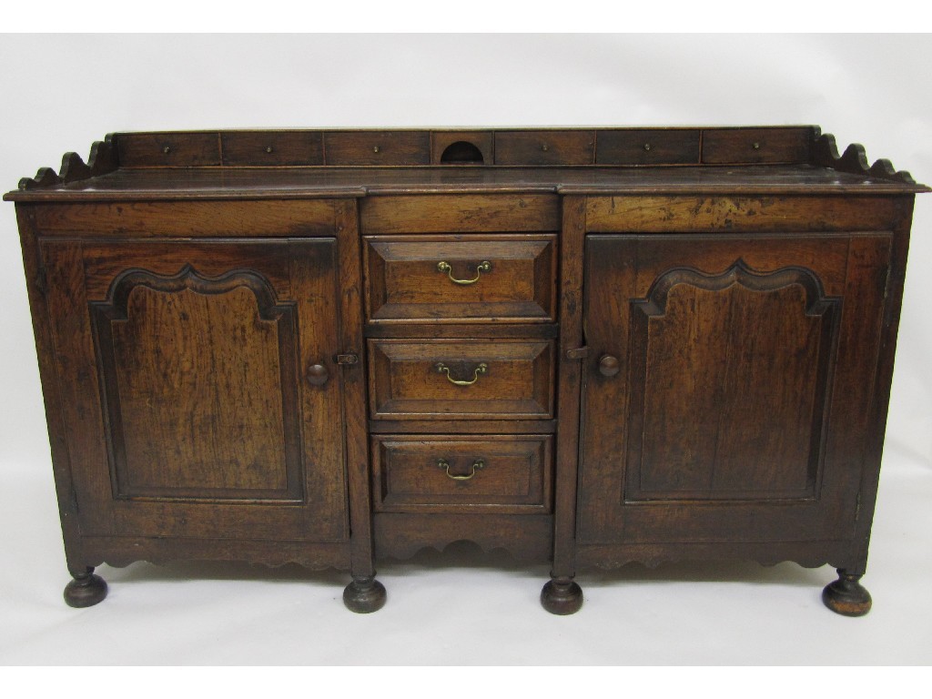 Appraisal: An th Century oak dresser the galleried back with six