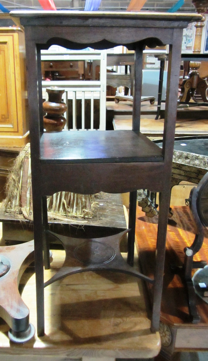 Appraisal: A th century mahogany two tier washstand and an oval