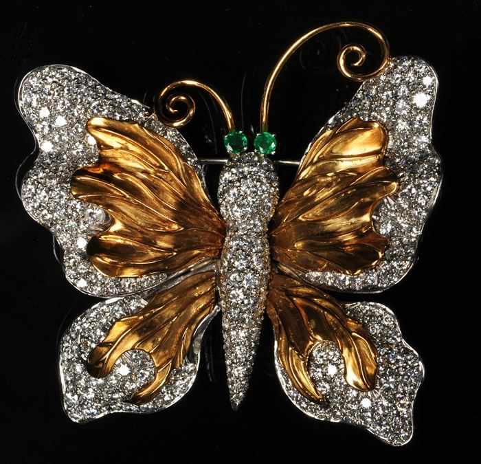 Appraisal: DIAMOND BUTTERFLY WITH EMERALD EYES Unmarked approx x in