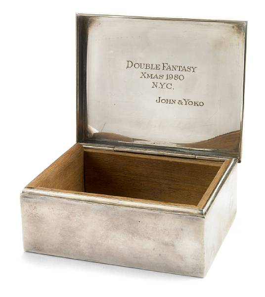 Appraisal: A John Lennon and Yoko Ono engraved Cartier sterling silver