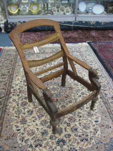 Appraisal: th Century Arm Chair with Dogheads on arm rests stripped