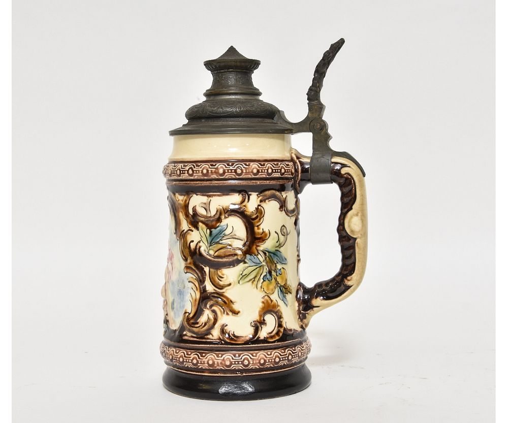 Appraisal: German Stein German stein with relief of Bacchus litre marked