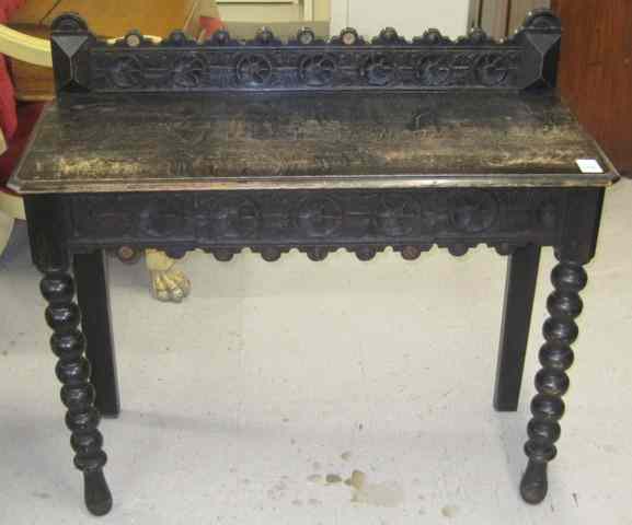 Appraisal: A VICTORIAN CARVED OAK PIER TABLE James II design English