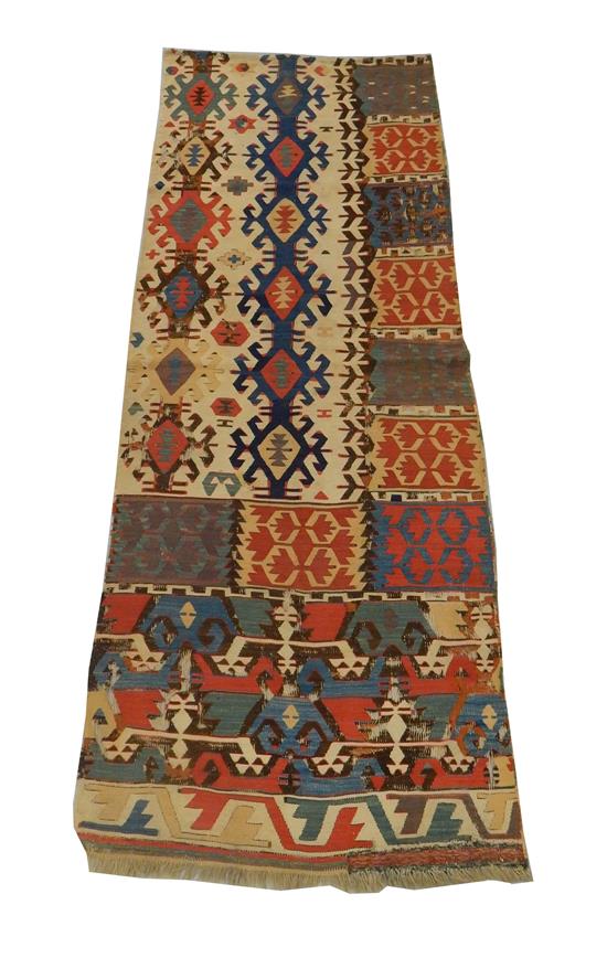 Appraisal: RUG Antique Persian Kilim fragment tan ground with cobalt blue