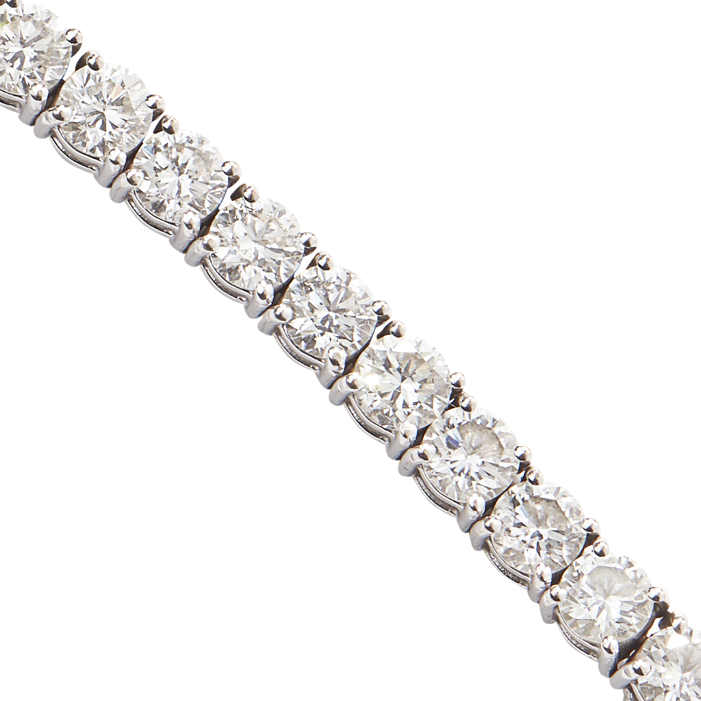 Appraisal: A diamond set line braceletclaw set with a row of