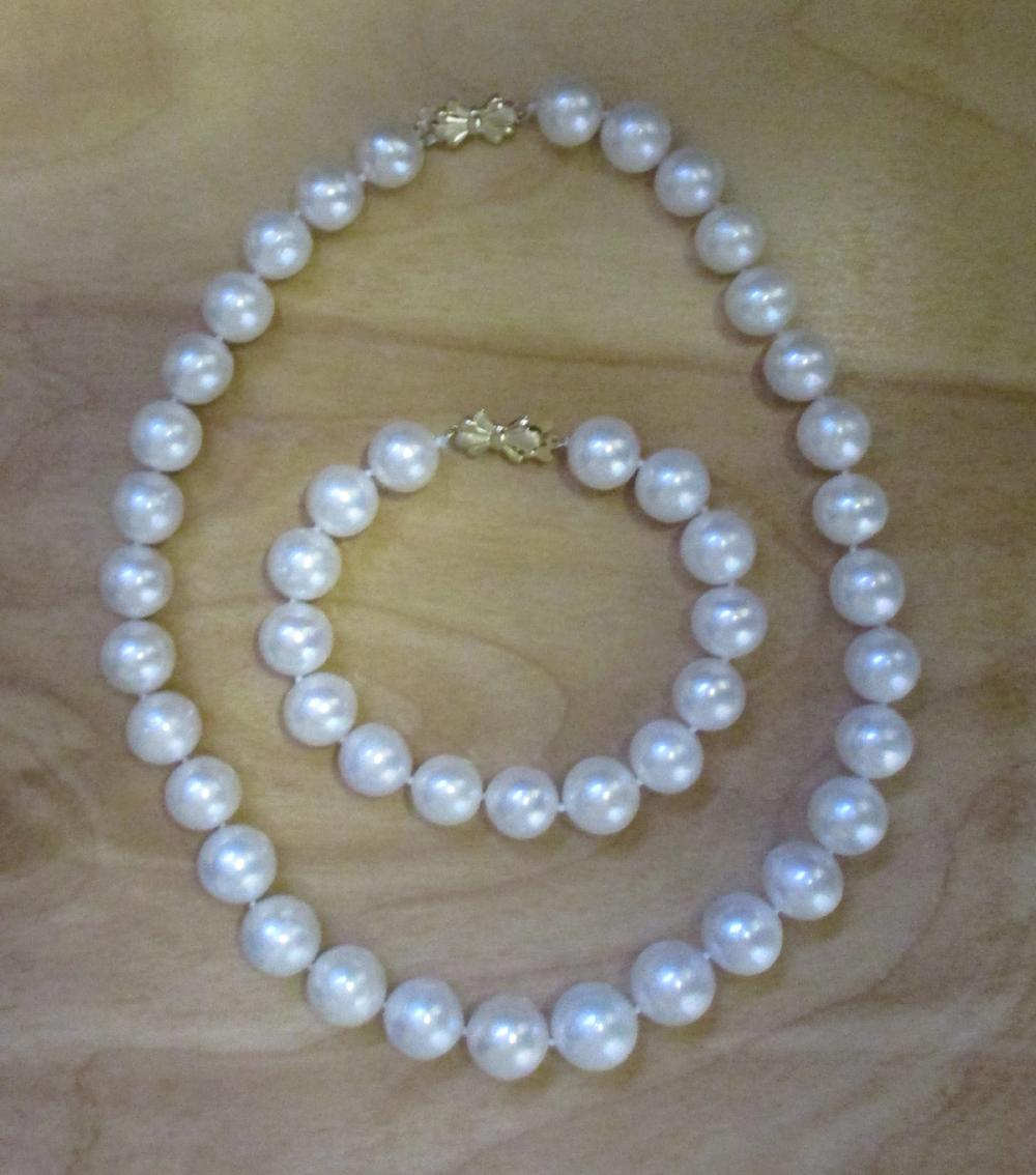 Appraisal: PEARL AND FOURTEEN KARAT GOLD NECKLACE AND BRACELET SET including