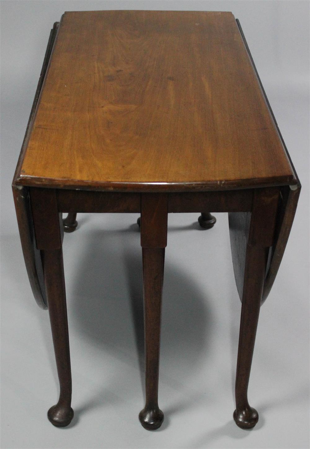 Appraisal: QUEEN ANNE MAHOGANY DINING TABLE the top with molded edges