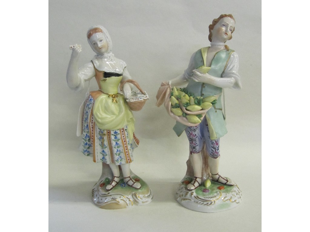 Appraisal: Pair of Dresden figures she selling buttons he lemons