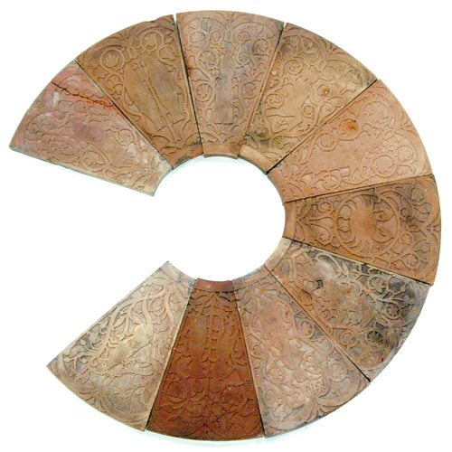 Appraisal: GRUEBY Ten astrological red clay tiles forming a incomplete circle