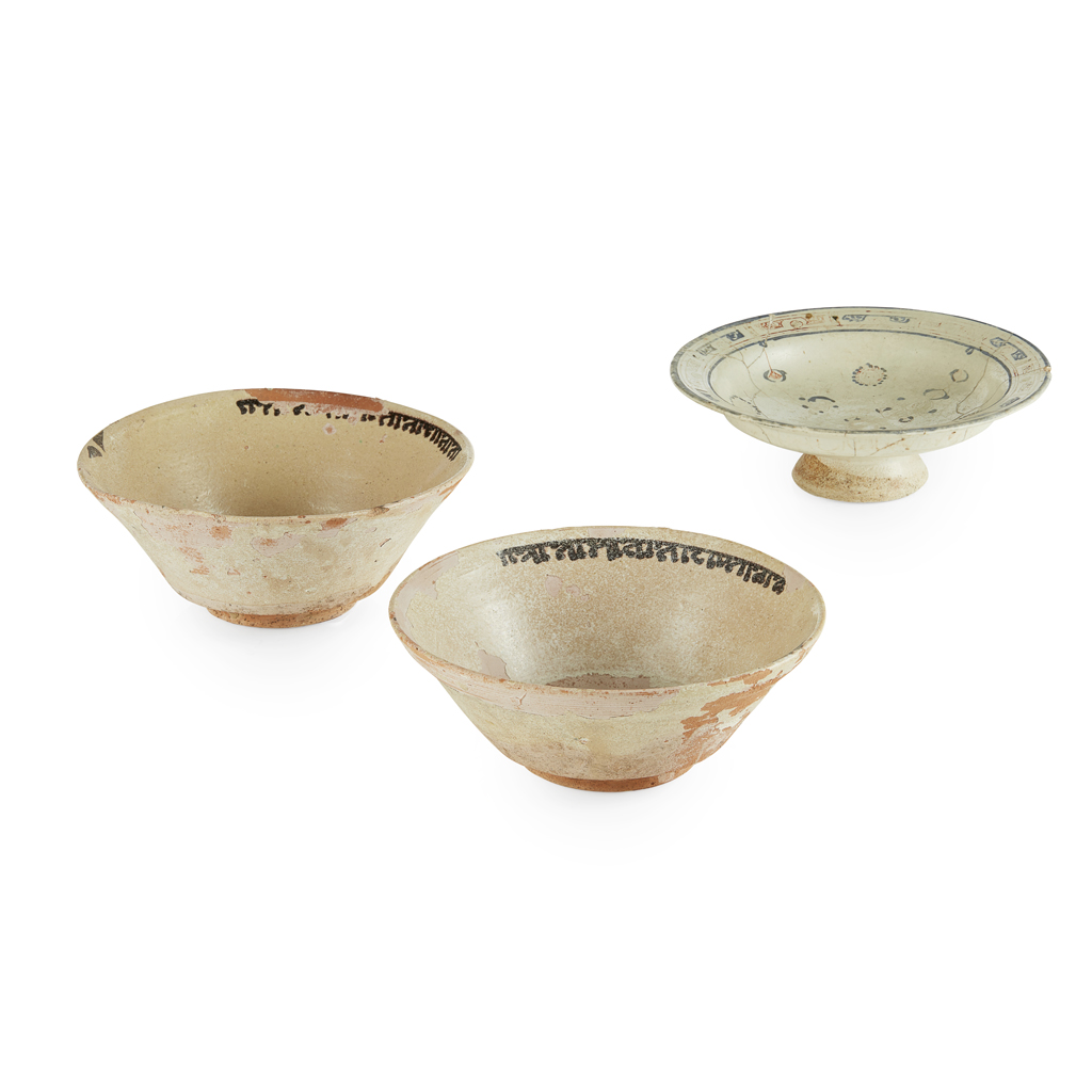 Appraisal: THREE IRANIAN POTTERY BOWLS TH TH CENTURY comprising a pair