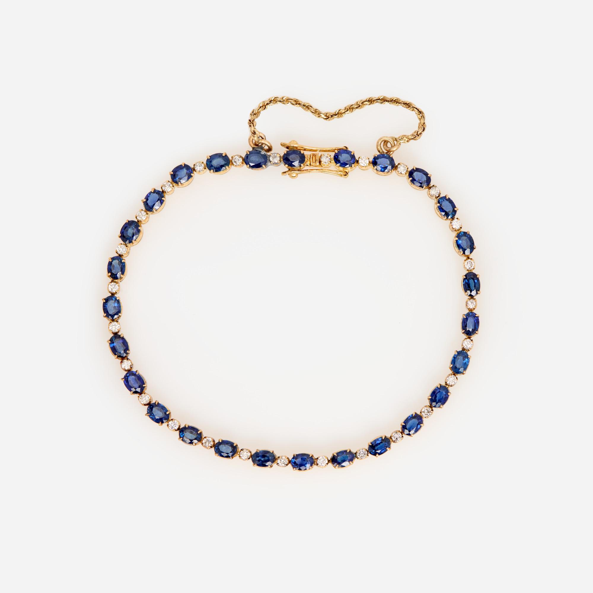 Appraisal: SAPPHIRE AND DIAMOND TENNIS BRACELET IN K A k yellow