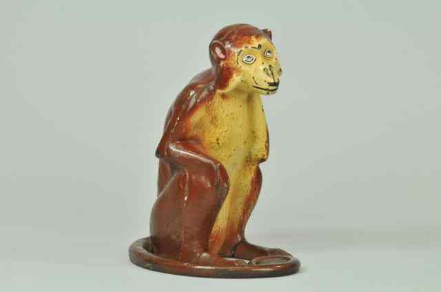 Appraisal: MONKEY DOORSTOP Hubley full figure cast iron three piece casting