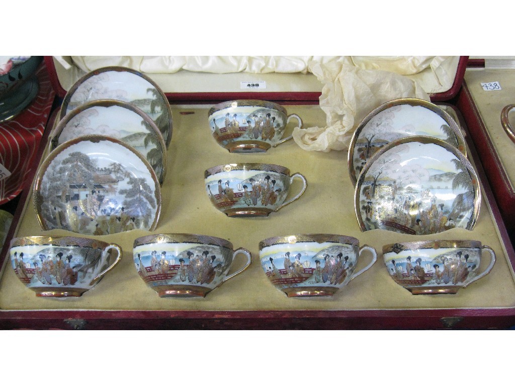 Appraisal: Cased six setting Japanese eggshell teaset and tea service saucer