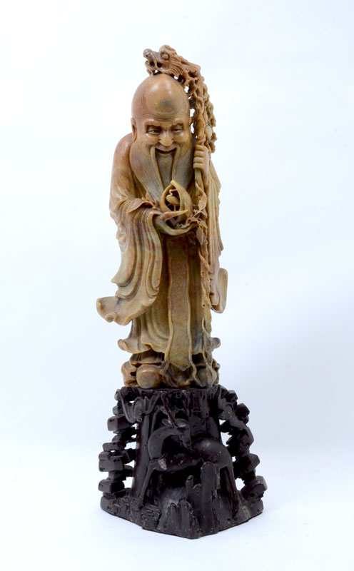 Appraisal: CHINESE FIGURAL SHOU XING SOAPSTONE CARVING ON STAND Nicely detailed