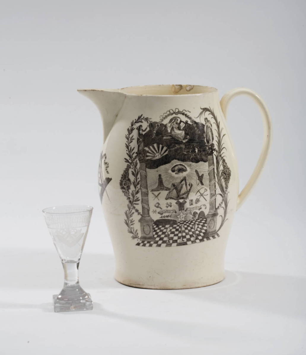 Appraisal: ENGLISH CREAMWARE BLACK TRANSFER-PRINTED MASONIC JUG CIRCA AND AN ENGRAVED