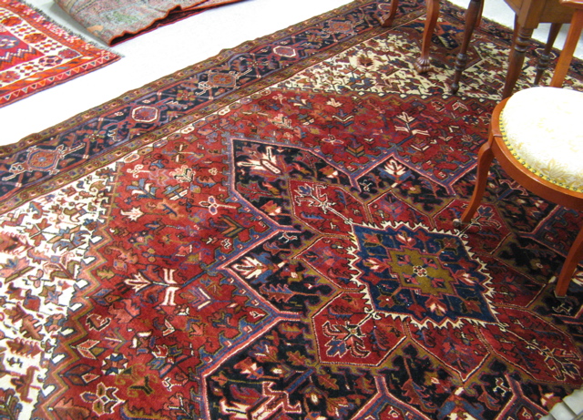 Appraisal: SEMI-ANTIQUE PERSIAN HERIZ CARPET Azarbaijan province eastern Iran centering a