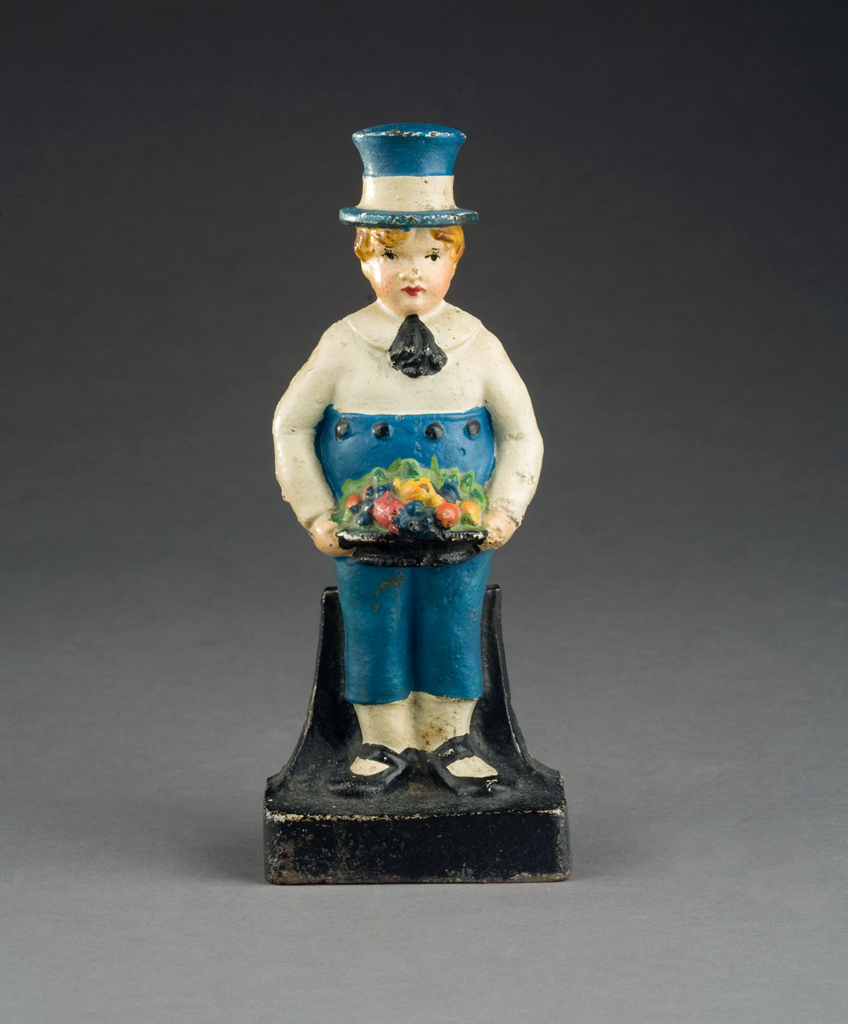 Appraisal: CAST-IRON 'DUTCH BOY' DOORSTOP Height inches