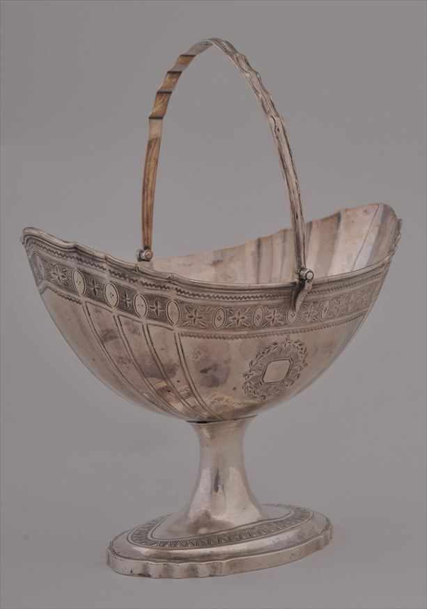 Appraisal: IRISH GEORGE III BRIGHT-CUT ENGRAVED SILVER SUGAR BASKET Richard Sawyer