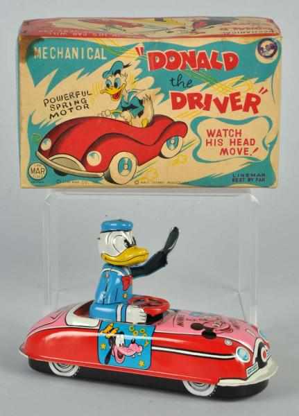 Appraisal: Tin Linemar Disney Donald the Driver Wind-Up Toy Description Japanese