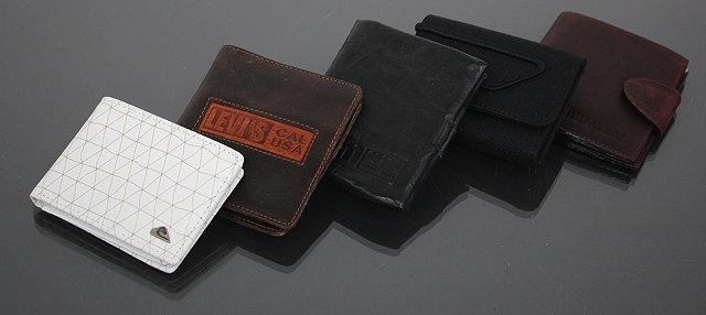 Appraisal: A LEATHER FOLD OVER WALLET by Levis together with two