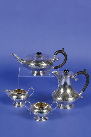 Appraisal: A FOUR PIECE TEA COFFEE SET of circular form with