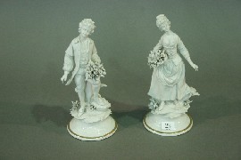 Appraisal: A pair of 'Capo-di-Monte' bisque figures