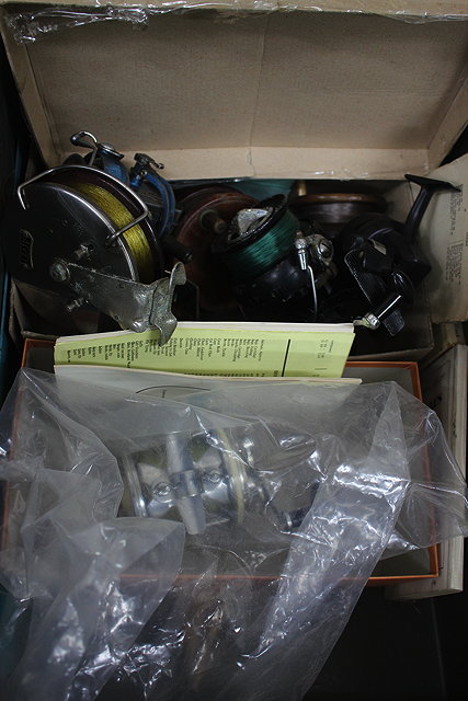 Appraisal: A QUANTITY OF FISHING REELS to include a French made