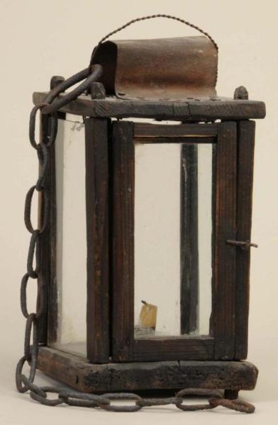 Appraisal: Wood Glass Tin Hanging Lantern Description th Century Wrought iron