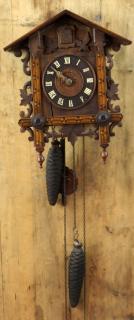 Appraisal: German Cuckoo clock with marquetry German Cuckoo clock with marquetry