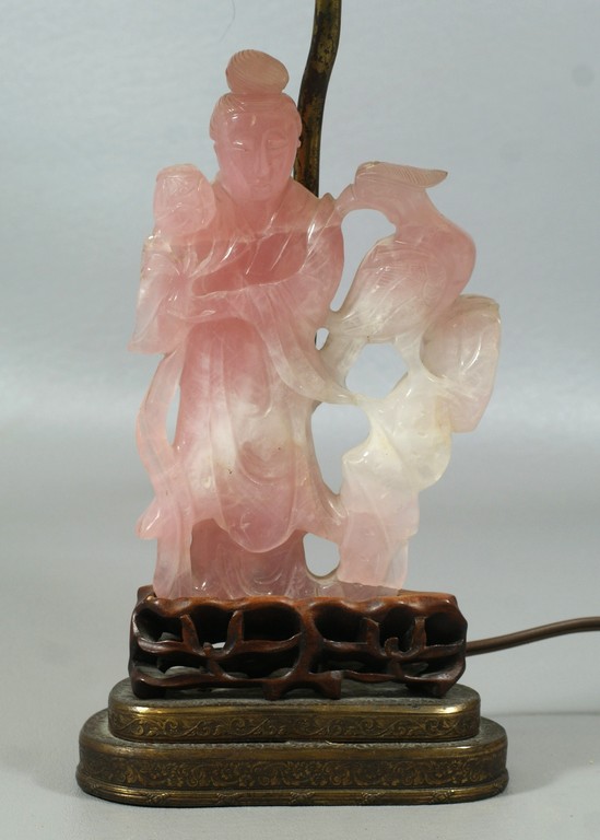 Appraisal: Carved rose quartz Quanyin lamp hardwood base to top of