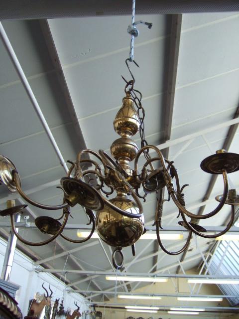 Appraisal: A three tier gilt metal chandelier th century and a