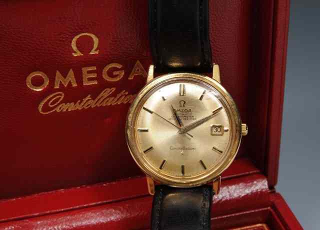 Appraisal: A GENTLEMANS OMEGA CONSTELLATION AUTOMATIC CHRONOMETER in original presentation box