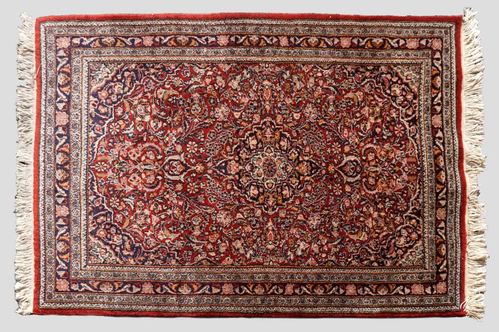 Appraisal: PERSIAN SAROUK HAND KNOTTED WOOL RUG the design with a