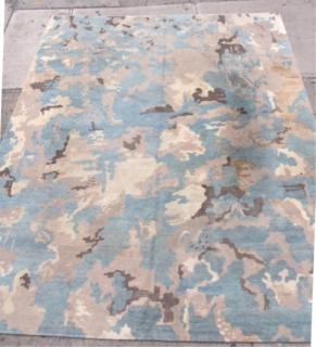 Appraisal: Contemporary Camouflage Carpet Having a blue ground Needs cleaning