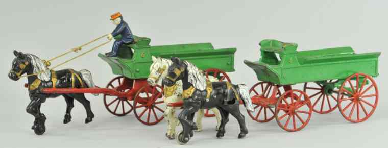 Appraisal: LOT OF TWO KENTON DRAY WAGONS Includes solo and two