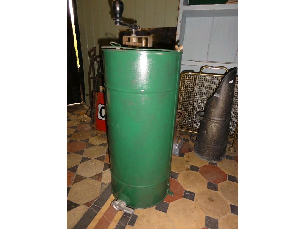 Appraisal: A vintage honey separator of cylindrical form with turned wooden