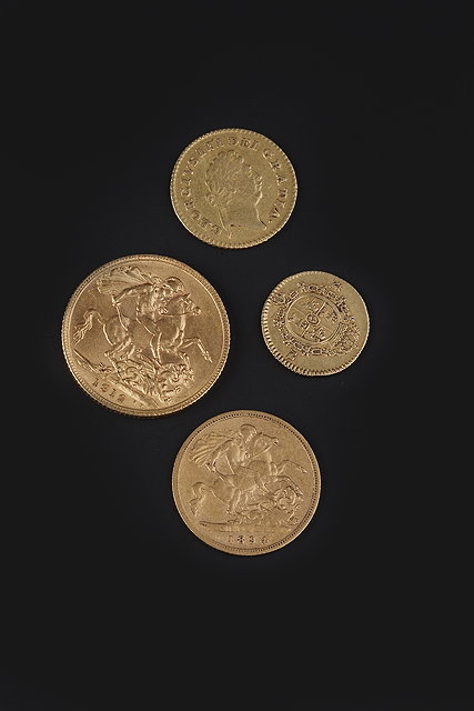 Appraisal: FOUR GOLD COINS comprising a George V sovereign dated a